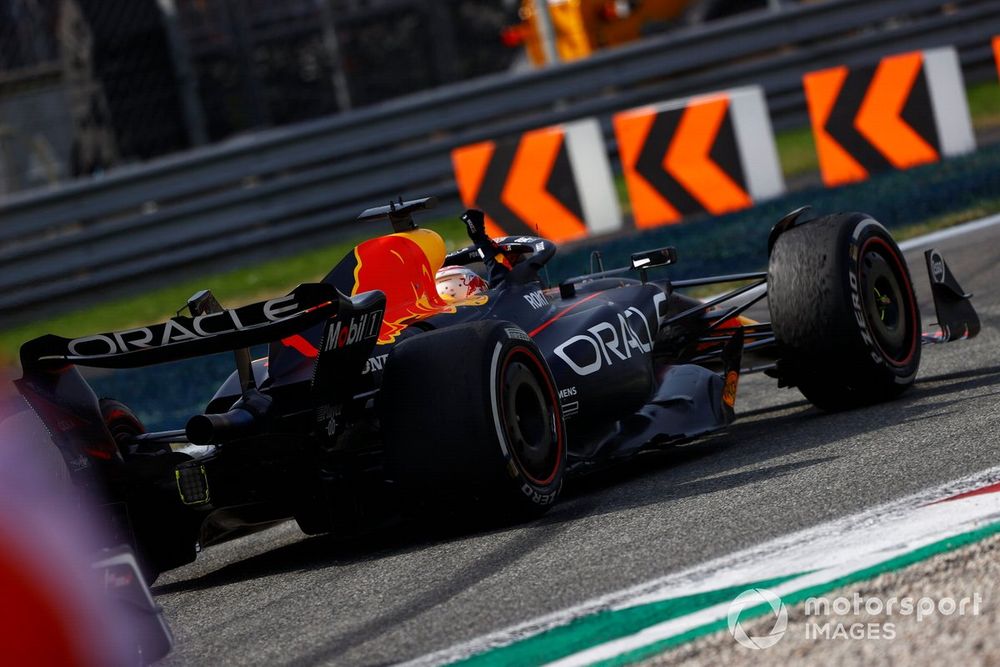 Max Verstappen, Red Bull Racing RB19, 1st position, celebrates on his way to Parc Ferme