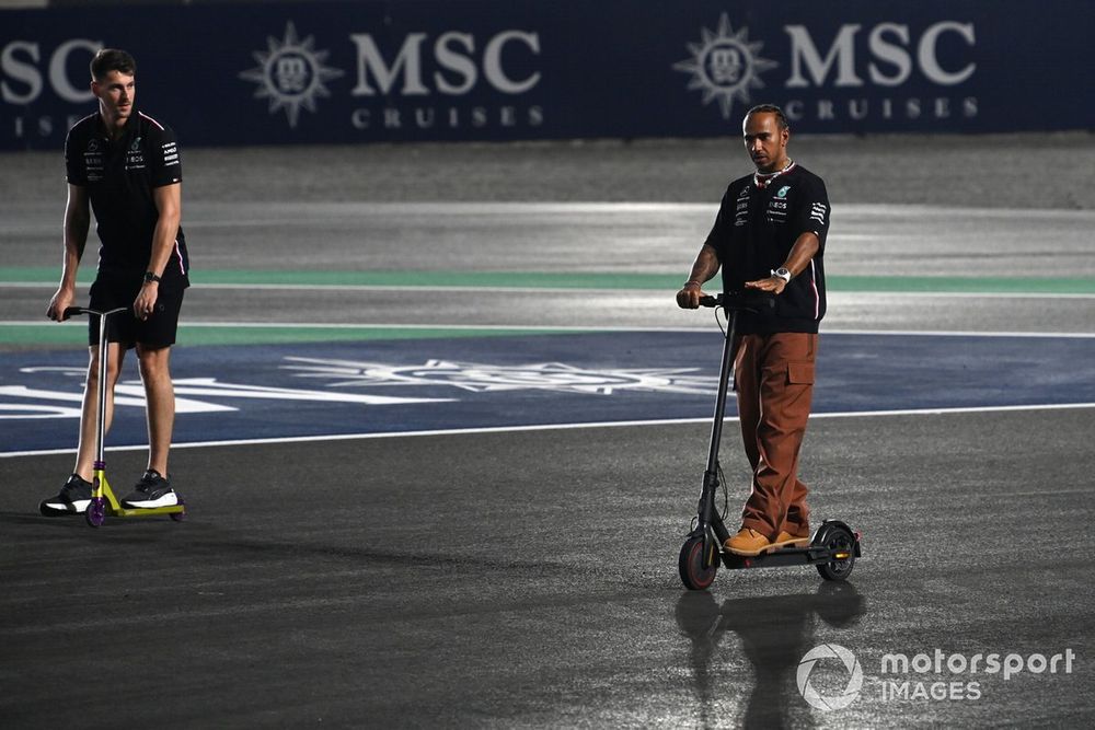 Lewis Hamilton, Mercedes-AMG tours the track on a scooter