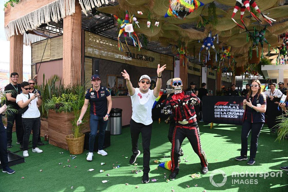 Max Verstappen, Red Bull Racing and Sergio Perez, Red Bull Racing and Mascots Fermin La Calaca and Mario Achi 