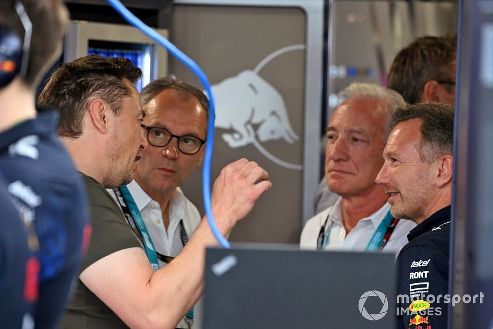Elon Musk, Stefano Domenicali, CEO, Formula 1, Greg Maffei, F1, Christian Horner, Team Principal, Red Bull Racing, talk in the Red Bull Racing garage