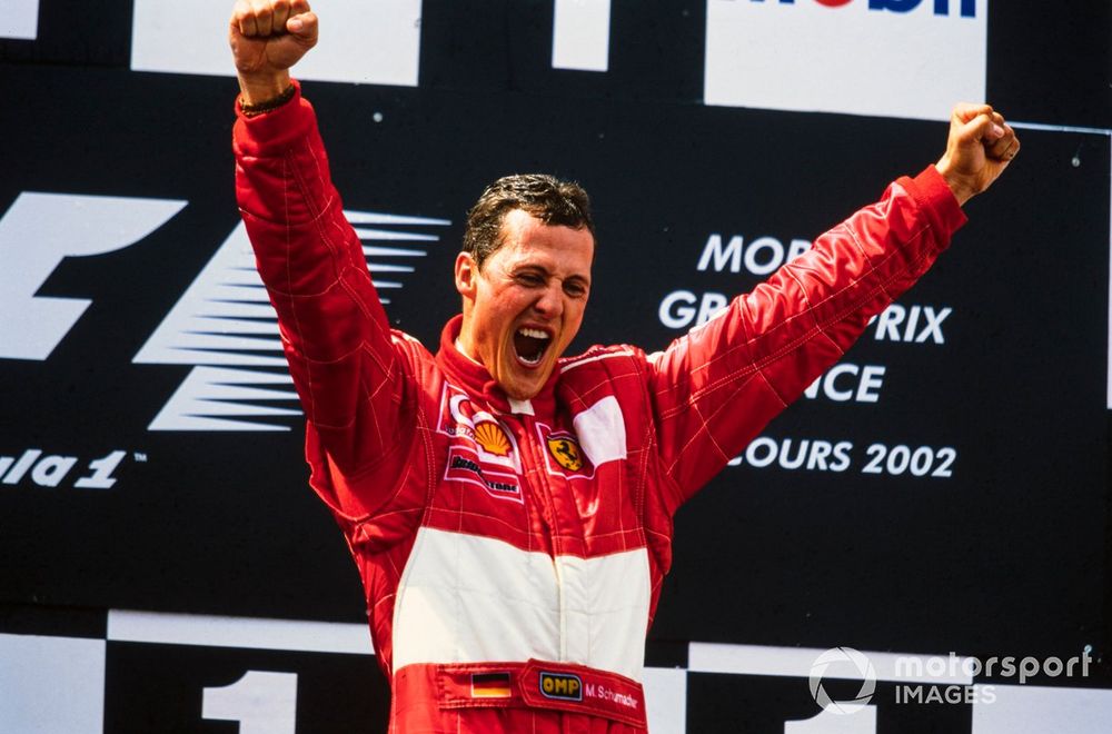 Michael Schumacher, 1st position, celebrates securing his fifth world drivers' championship on the podium