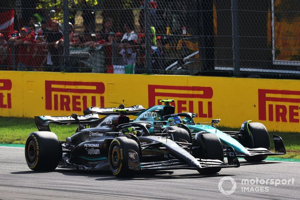 Lewis Hamilton, Mercedes F1 W14, leads Fernando Alonso, Aston Martin AMR23