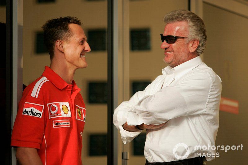 Michael Schumacher, Ferrari talks to manager Willi Weber
