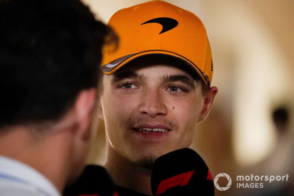 Lando Norris, McLaren, talks to the media