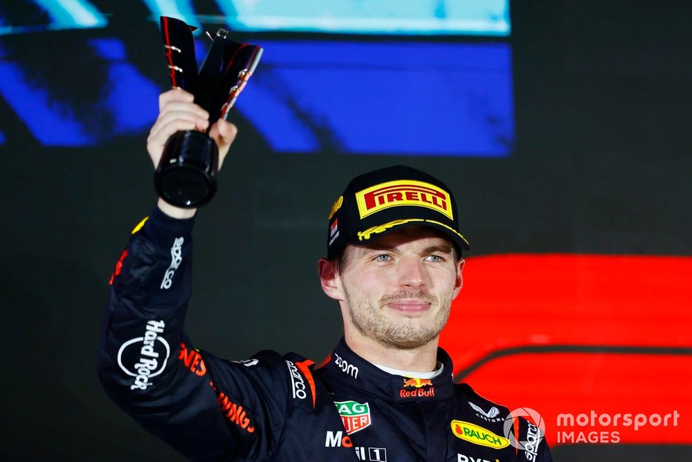 Max Verstappen, Red Bull Racing, 2nd position, lifts the trophy in celebration 