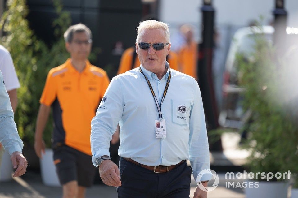 Johnny Herbert, former driver and FIA steward, arrives at the track 