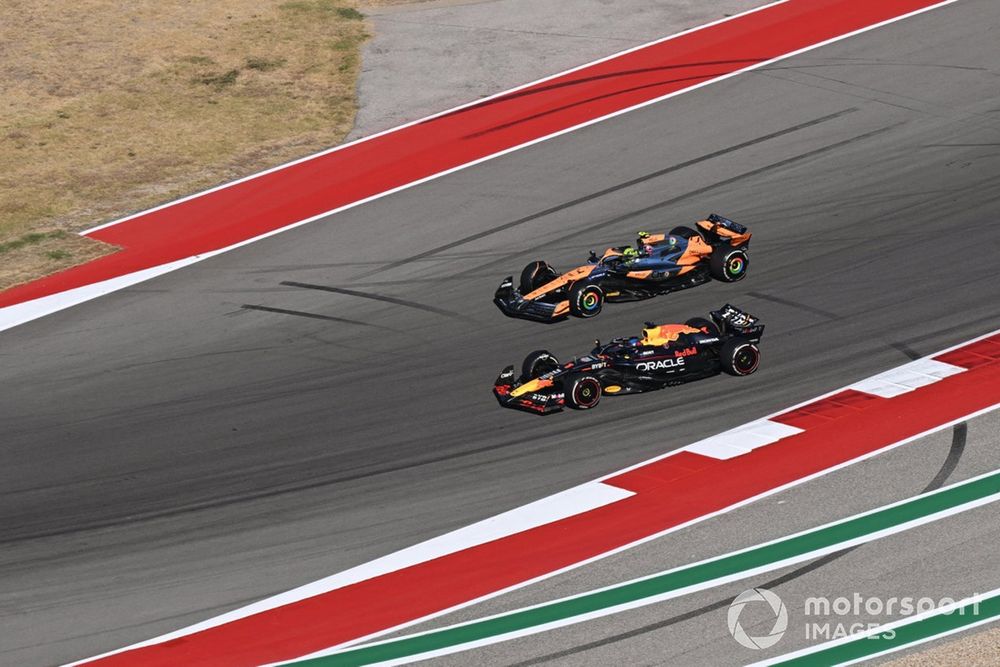 Lando Norris, McLaren MCL38, battles with Max Verstappen, Red Bull Racing RB20 