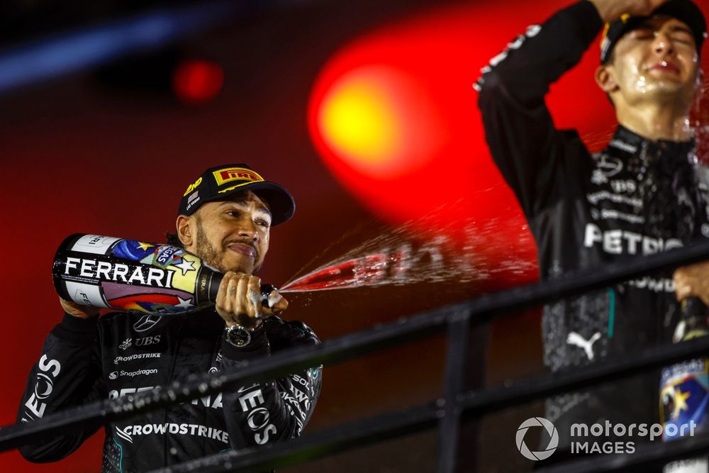 Lewis Hamilton, Mercedes-AMG F1 Team, 2nd position, sprays George Russell, Mercedes-AMG F1 Team, 1st position, with Champagne on the podium