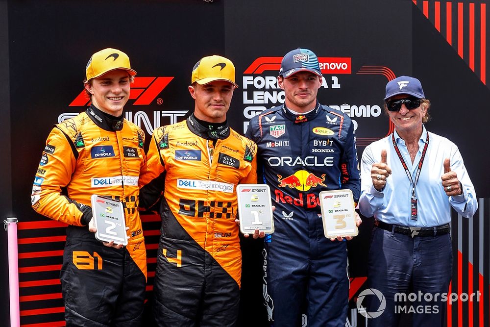 Oscar Piastri, McLaren F1 Team, 2nd position, Lando Norris, McLaren F1 Team, 1st position, Max Verstappen, Red Bull Racing, 3rd position, receive their Sprint trophies from Emerson Fittipaldi