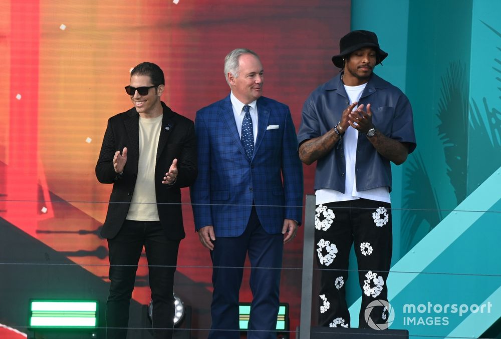 Steven Kalifowitz, CMO, Crypto, Tim Mayer, Director of Automobile Competition Committee of the United States, and Miami Dolphins Cornerback Jalen Ramsey, on the podium for the trophy presentations