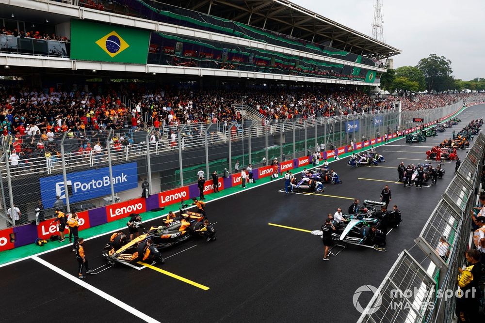 Mechanics clear the grid prior to the start