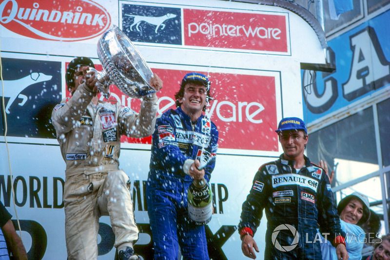 Podium: race winner Alain Prost, Renault, second place Carlos Reutemann, Williams, third place René 